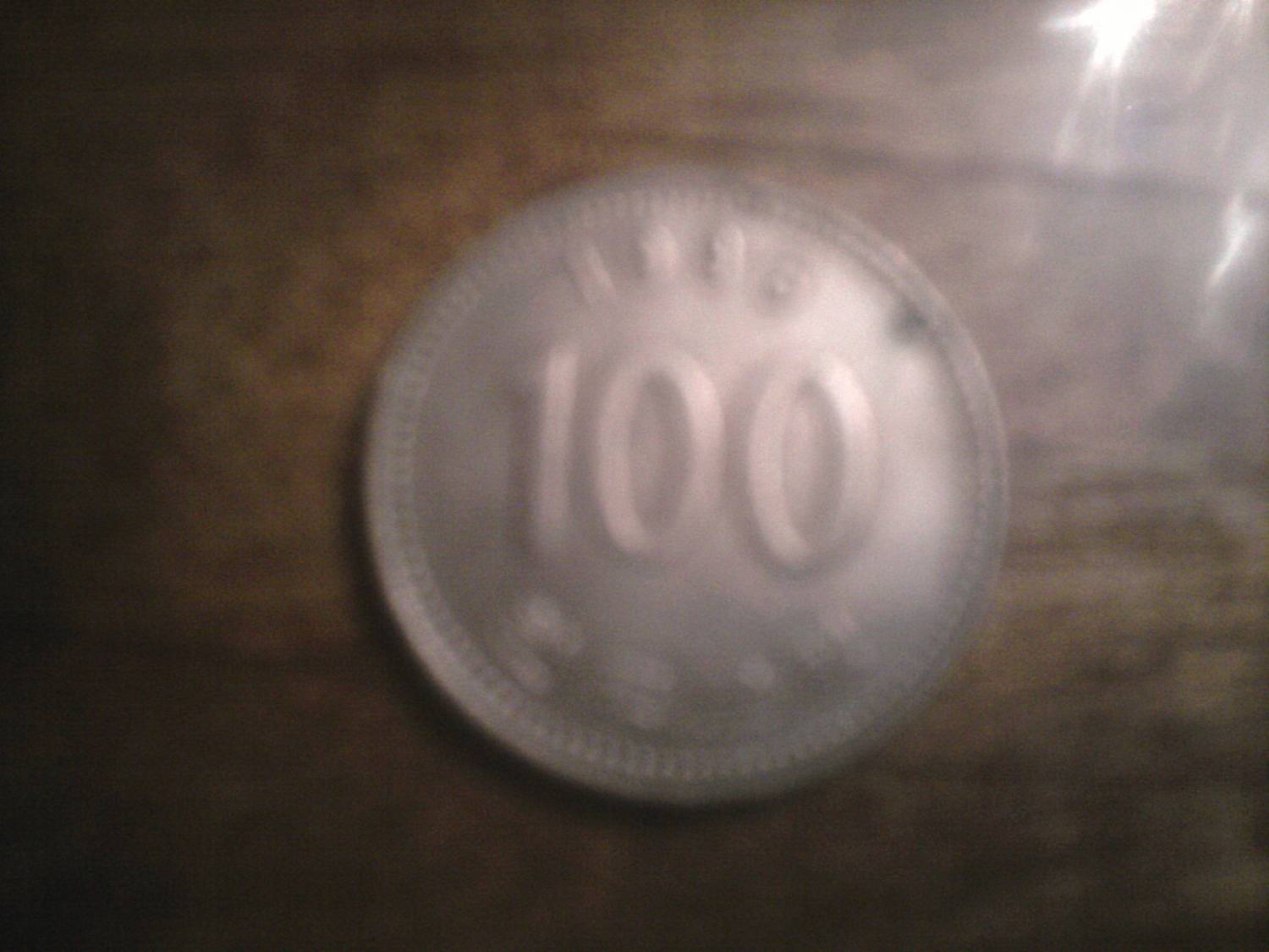 Монета 100 иен